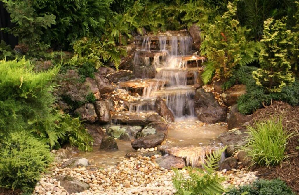 Waterfall custom built outdoor water features for any backyard landscape design.