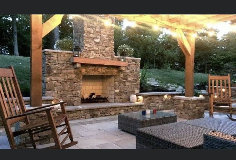 Outdoor living area with fireplace and patio