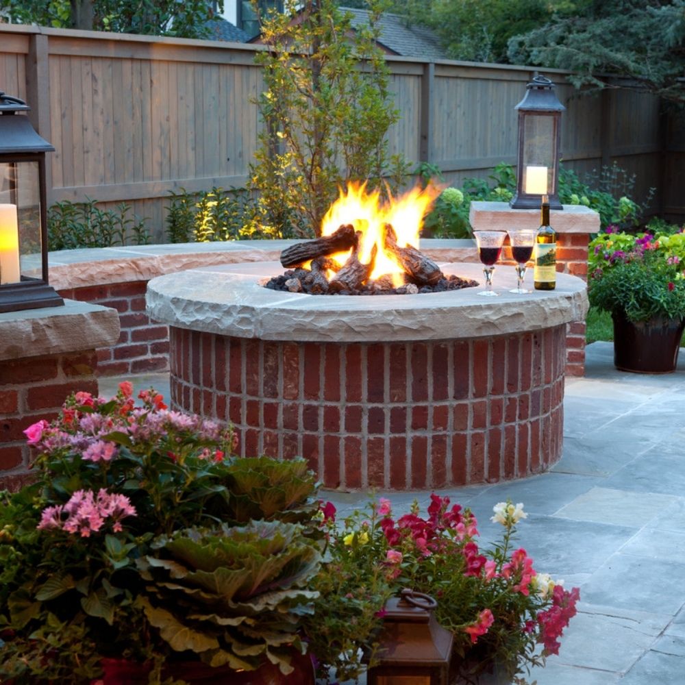 landscape design in boston featuring backyard fire pit and patio pavers