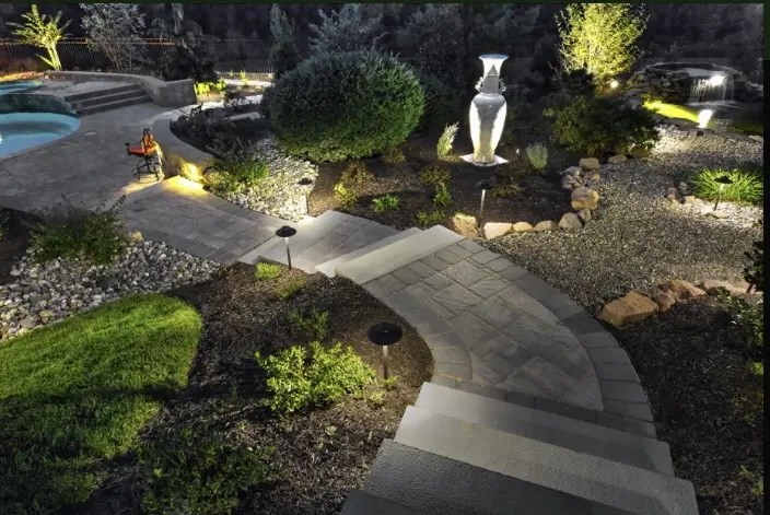 Outdoor lighting helps create the perfect landscape design mood for after-dark relaxing
