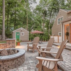 patio pavers and fire pit in a residential backyard in Massachusetts