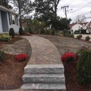 driveway and walkway paver installation by JM mento landscape design in Massachsuetts