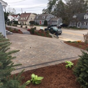 paver base material and patio driveway paver installation in residential Massachusetts neighborhood